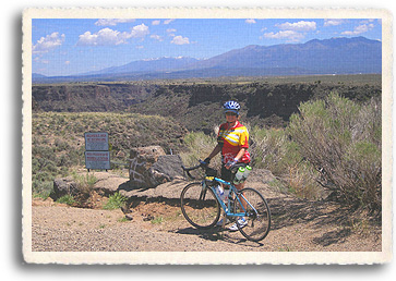 The Taos Mountains provide a stunning backdrop for this Taos area road ride, the end loop of the Enchanted Circle.